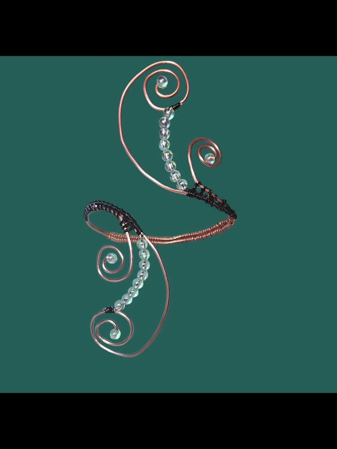 Copper and black wire, beaded Arm band