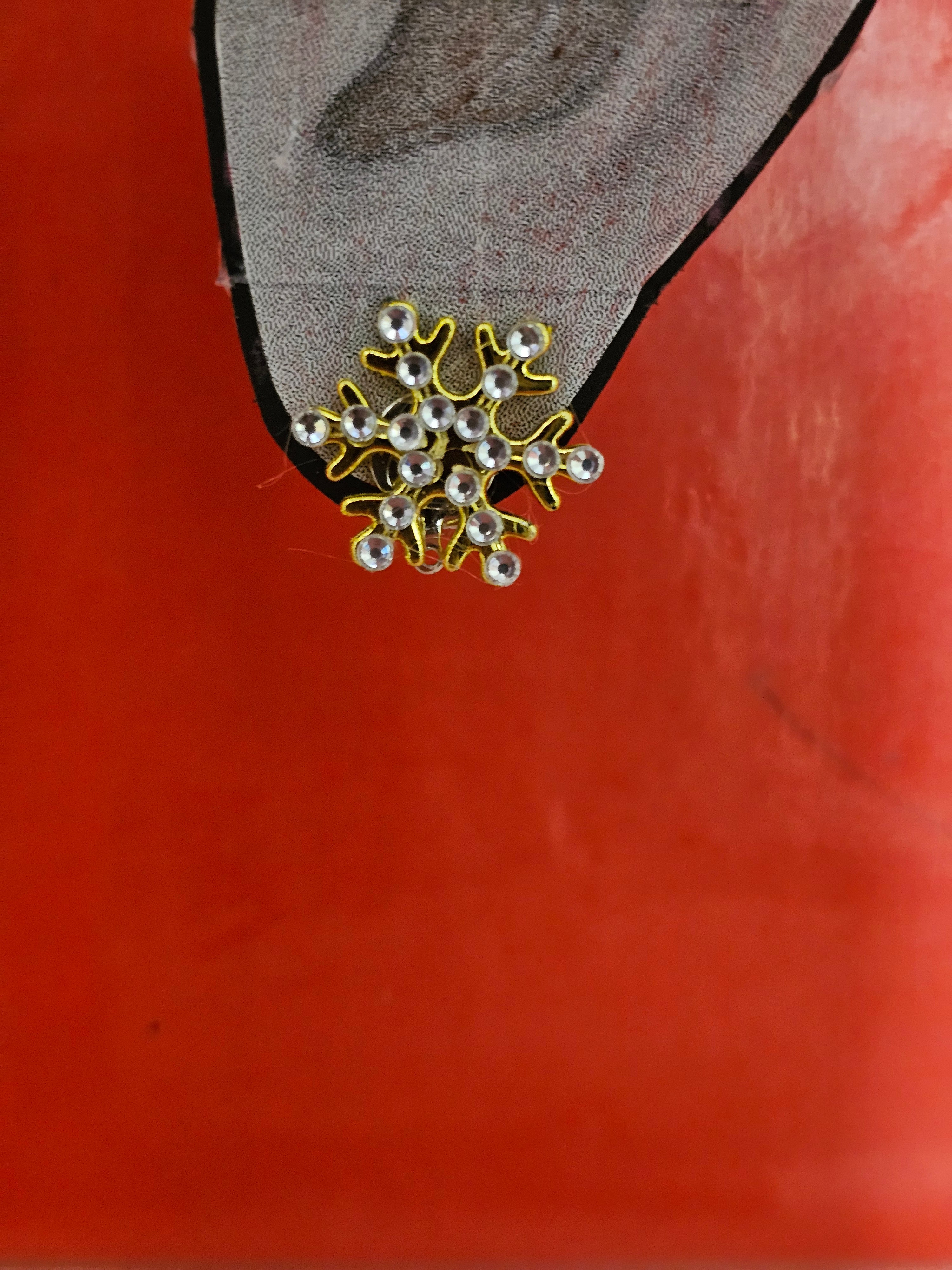 Snowflake clip-on earrings with diamante