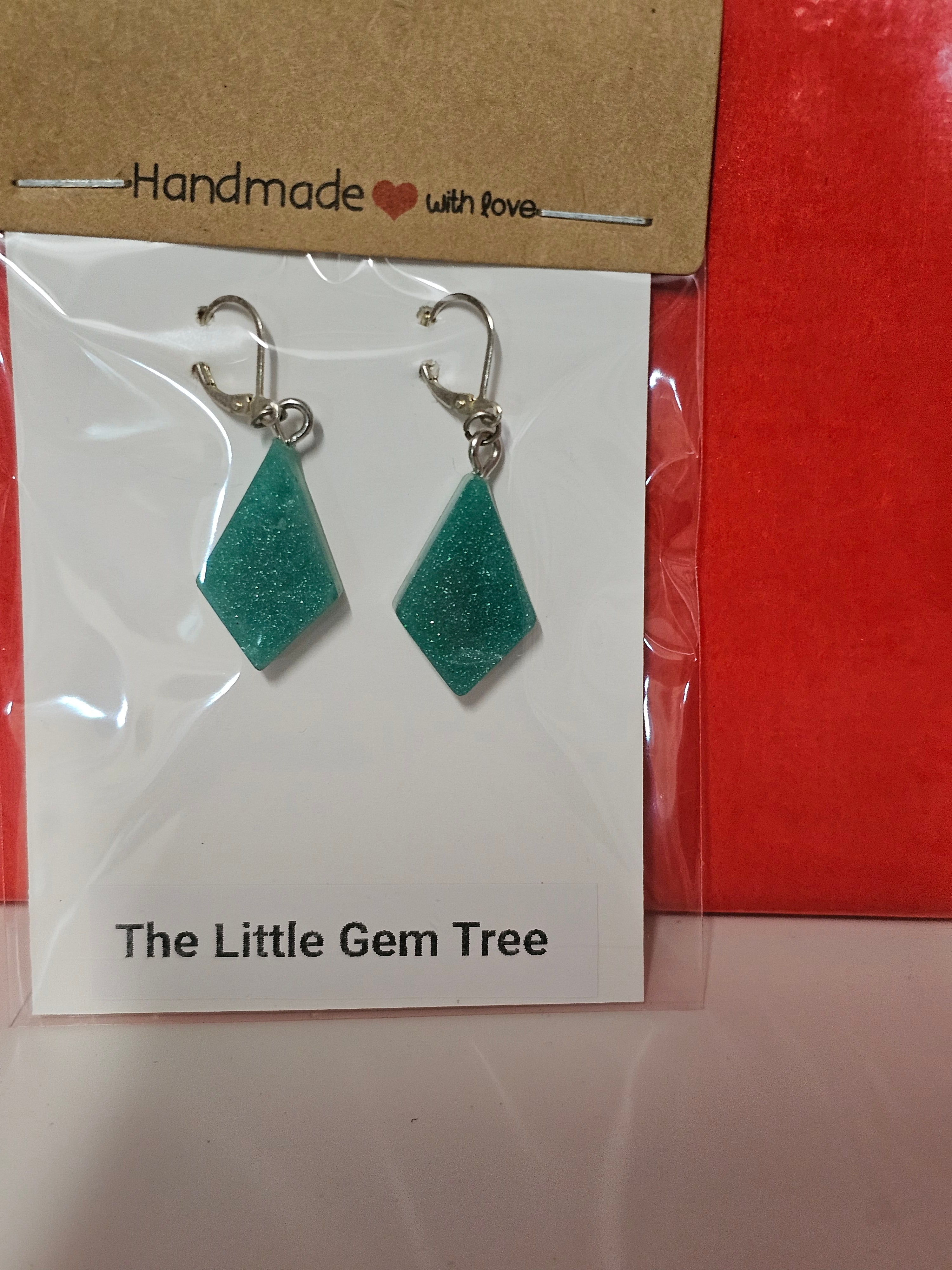 green kite style earrings