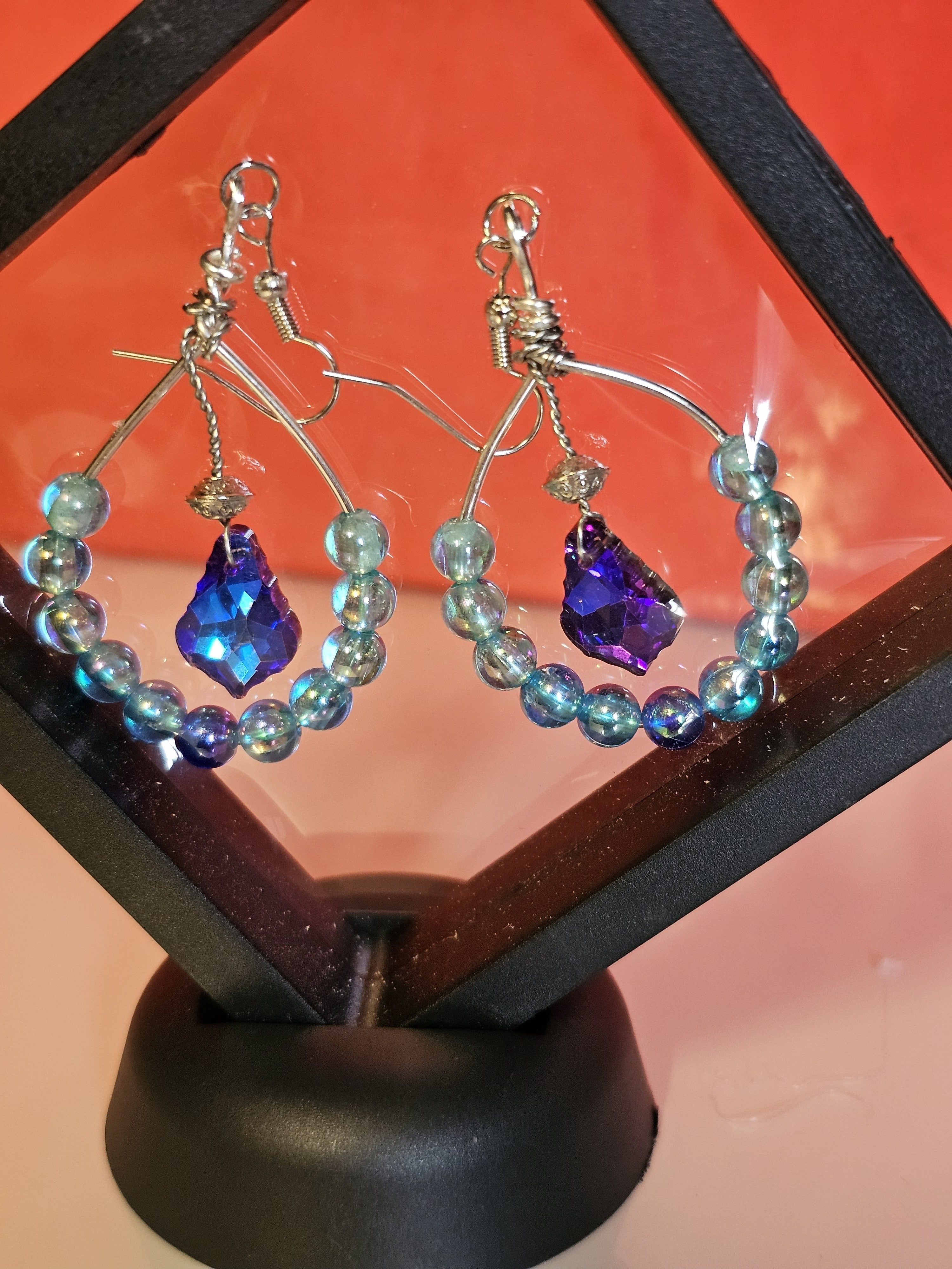 silver and blue hooped earrings