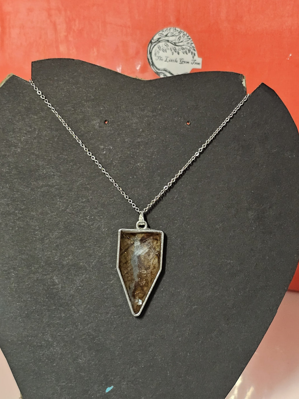 orange leaf in a sign shape pendent