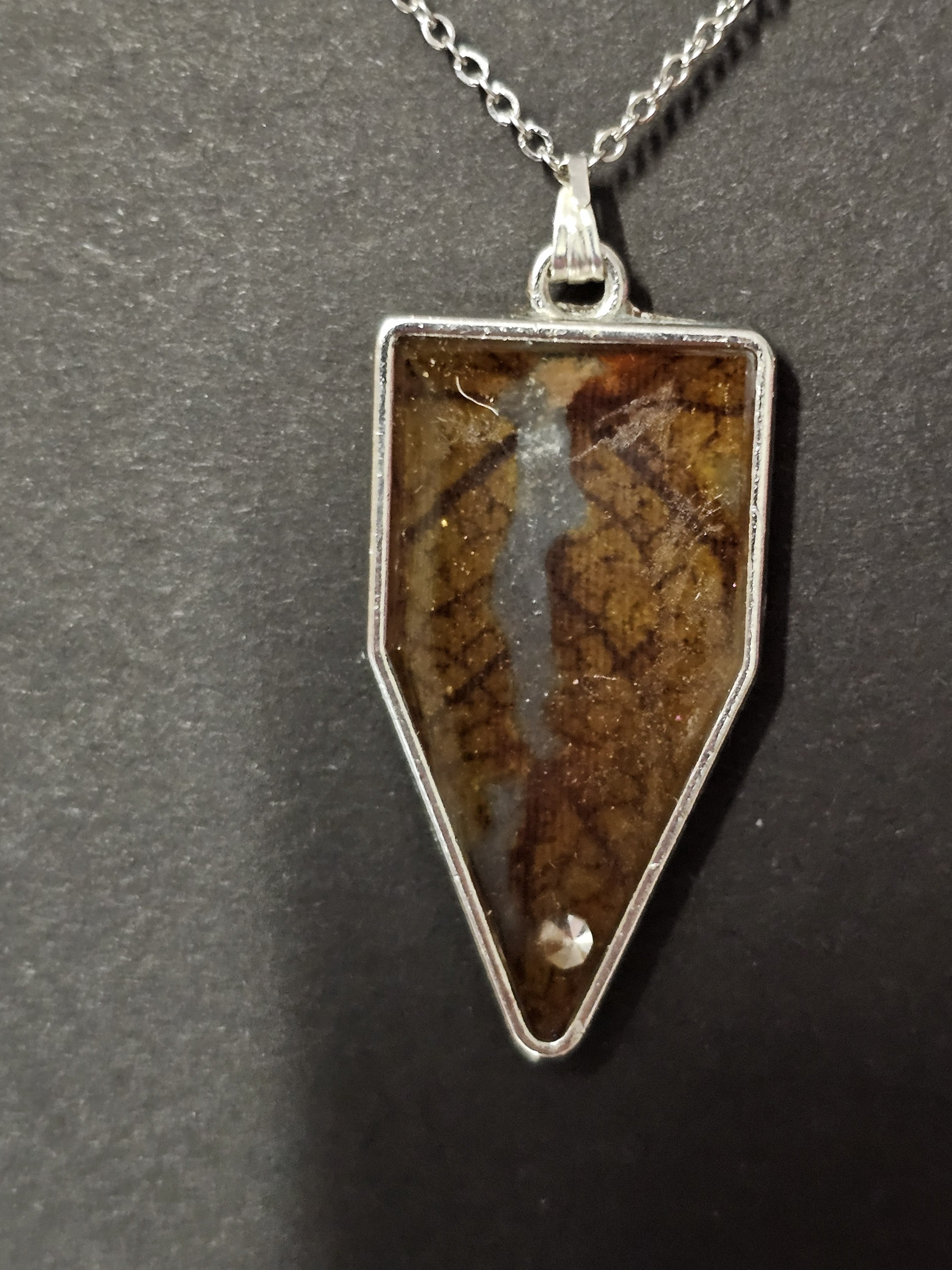 orange leaf in a sign shape pendent