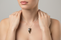 orange leaf in a sign shape pendent