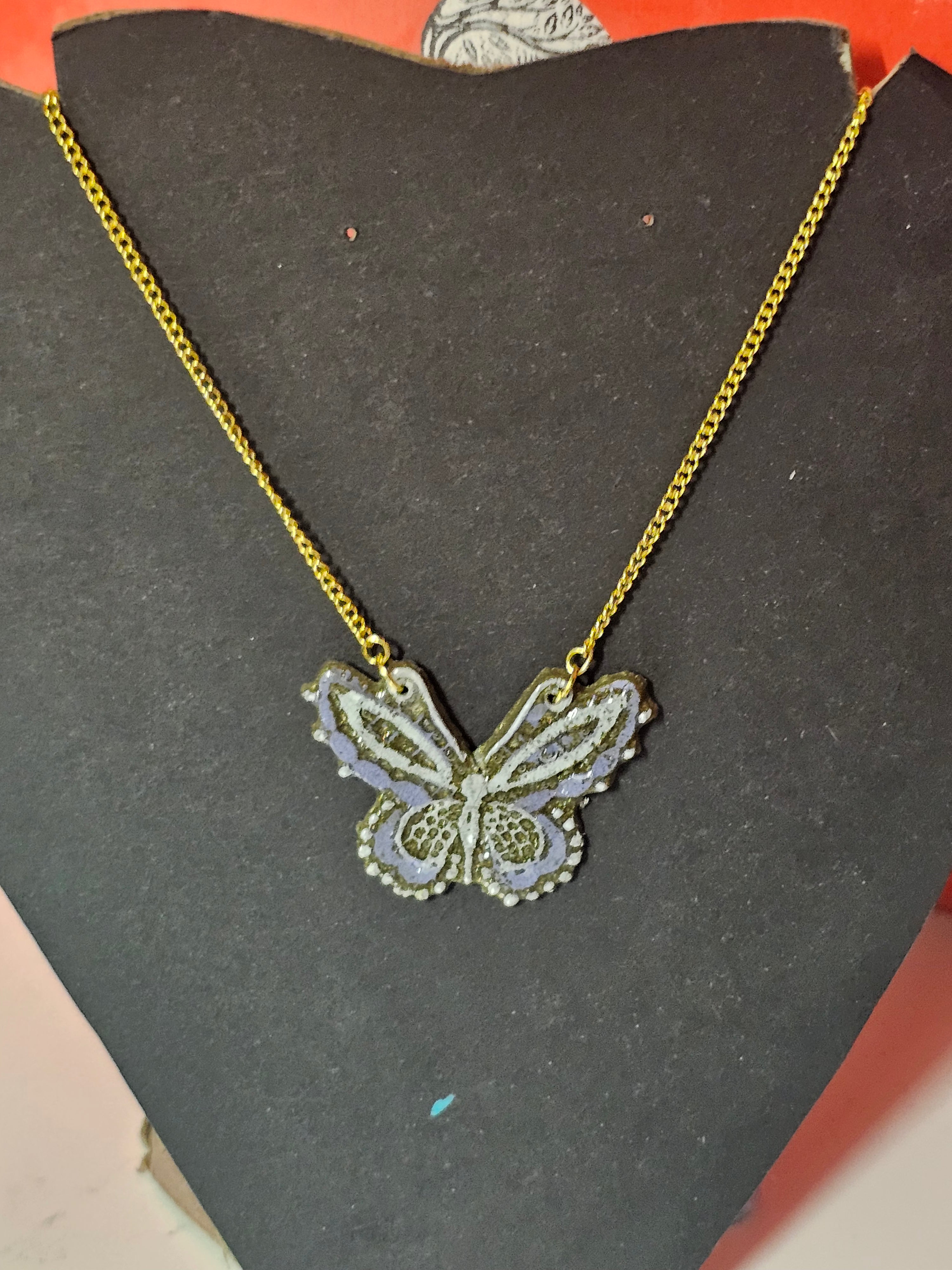 Purple resin butterfly with gold chain