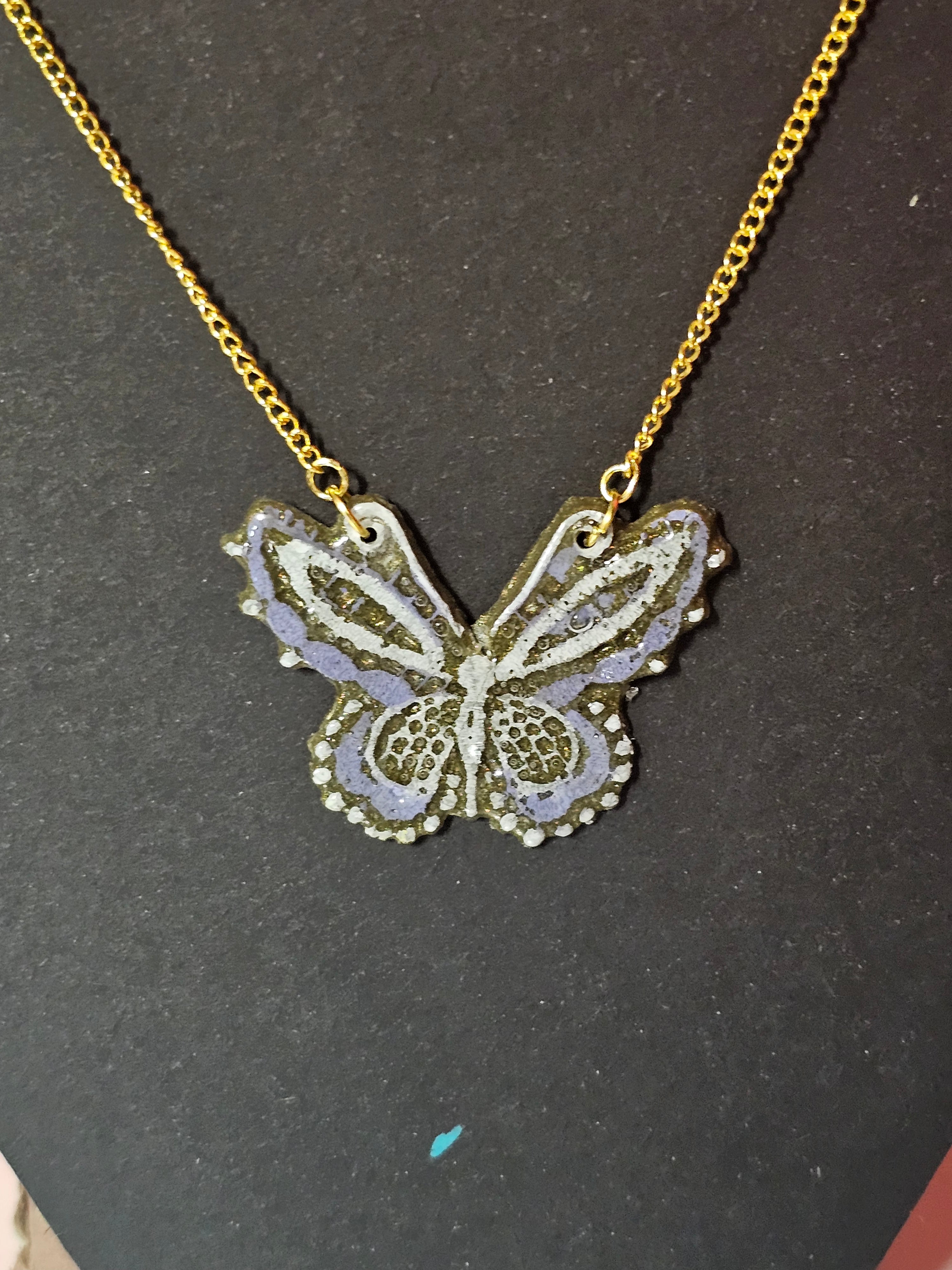 Purple resin butterfly with gold chain