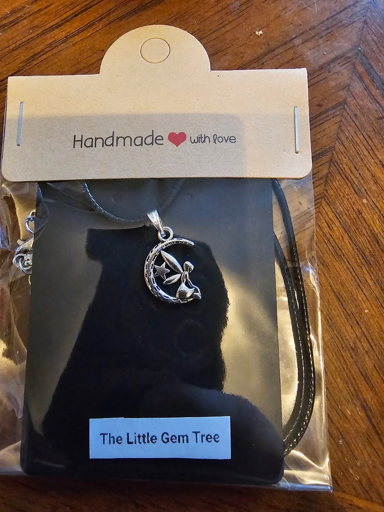 fairy on moon pendent on cord