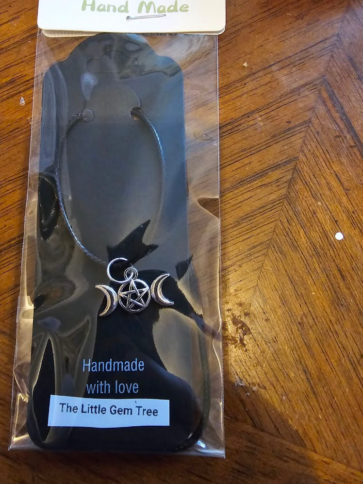 goddess Hecate symbol pendant on cord