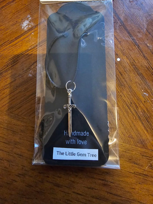 dagger pendent on cord (not as big as it is on model)