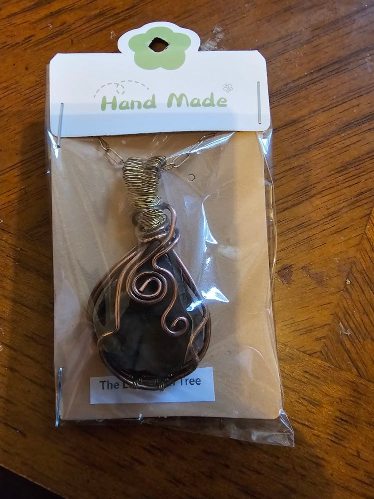 stone wrapped in copper in a potion shape bottle pendent and chain