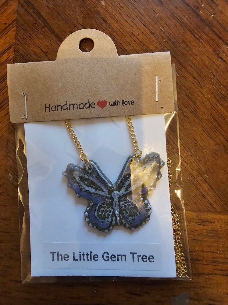 Purple resin butterfly with gold chain