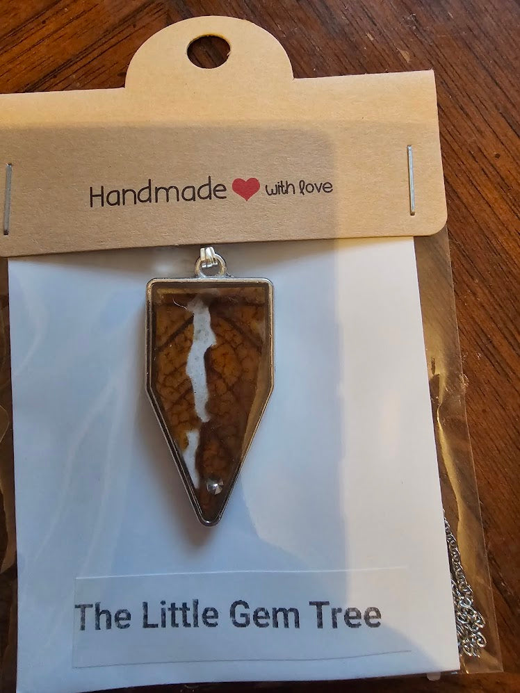 orange leaf in a sign shape pendent
