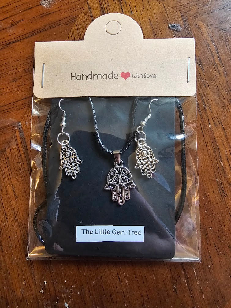 hand symbol pendent and earrings set