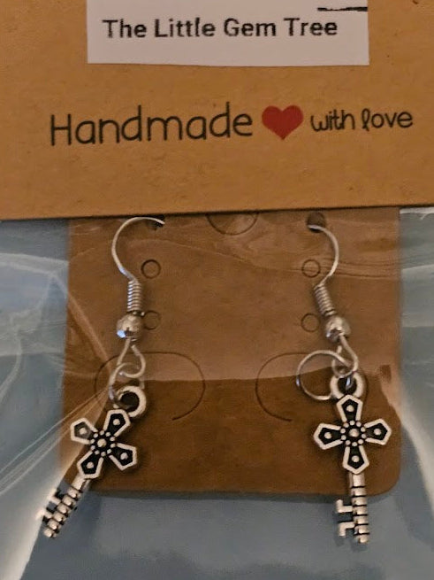 Pair of silver cross keys earrings on a 'The Little Gem Tree' branded card.