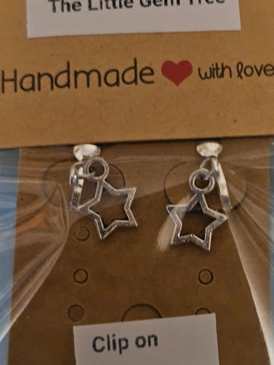 Star-shaped earrings on a 'The Little Gem Tree' branded card with 'Handmade with love' text.