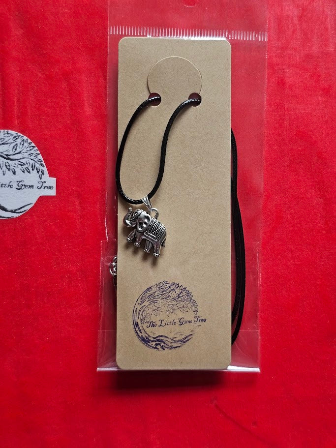 decorative elephant pendent on a cord