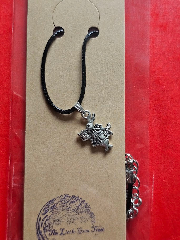 follow the white rabbit pendent on cord